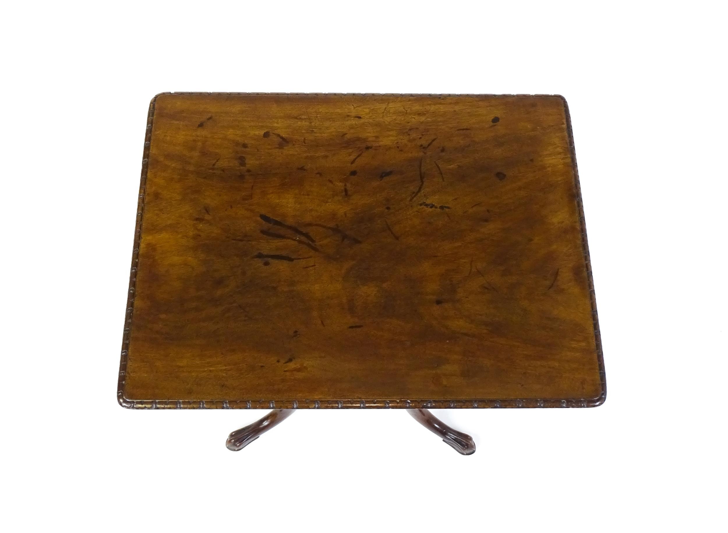 A late 18thC / early 19thC mahogany occasional table with a rectangular top and carved edge above - Image 8 of 12