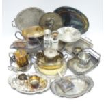 A quantity of assorted silver plate to include trays, serving dishes, bread plates, an Old Sheffield