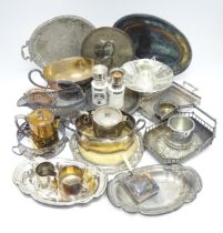 A quantity of assorted silver plate to include trays, serving dishes, bread plates, an Old Sheffield