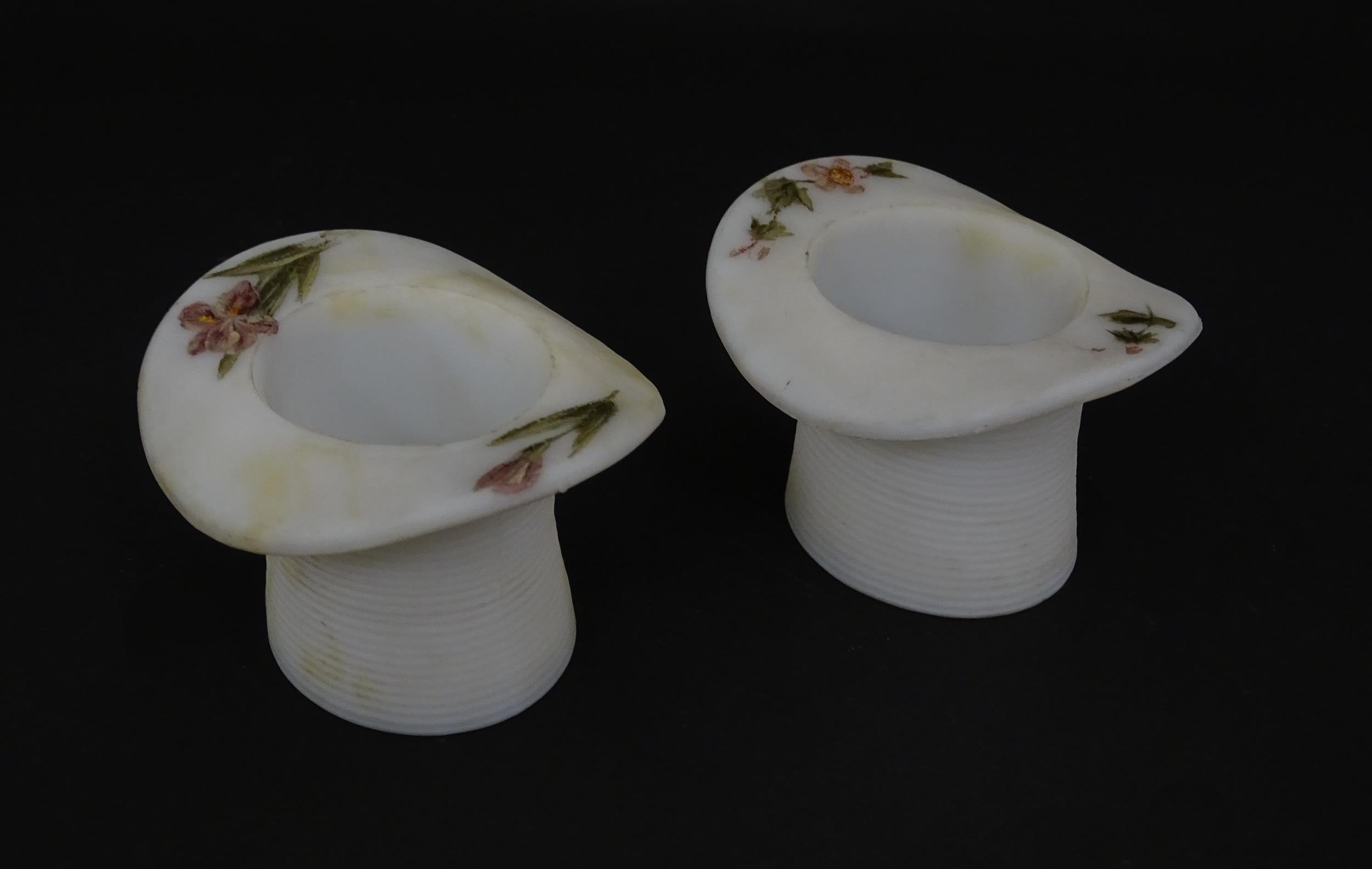 A pair of milk glass match holders / vesta keeps formed as top hats with hand painted floral detail. - Image 7 of 13