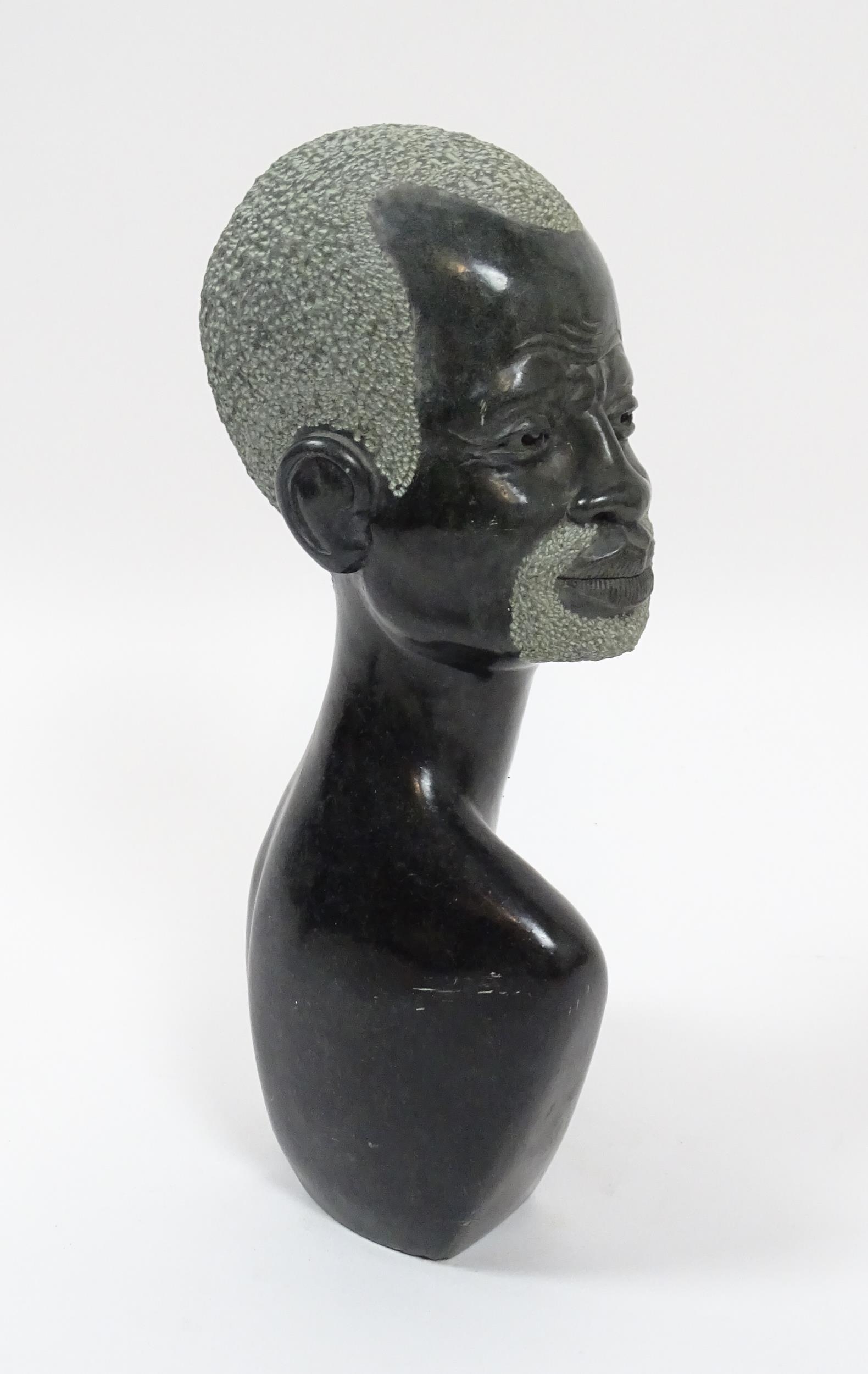 Ethnographic / Native / Tribal : An African carved soapstone bust modelled as the head of a - Image 6 of 7