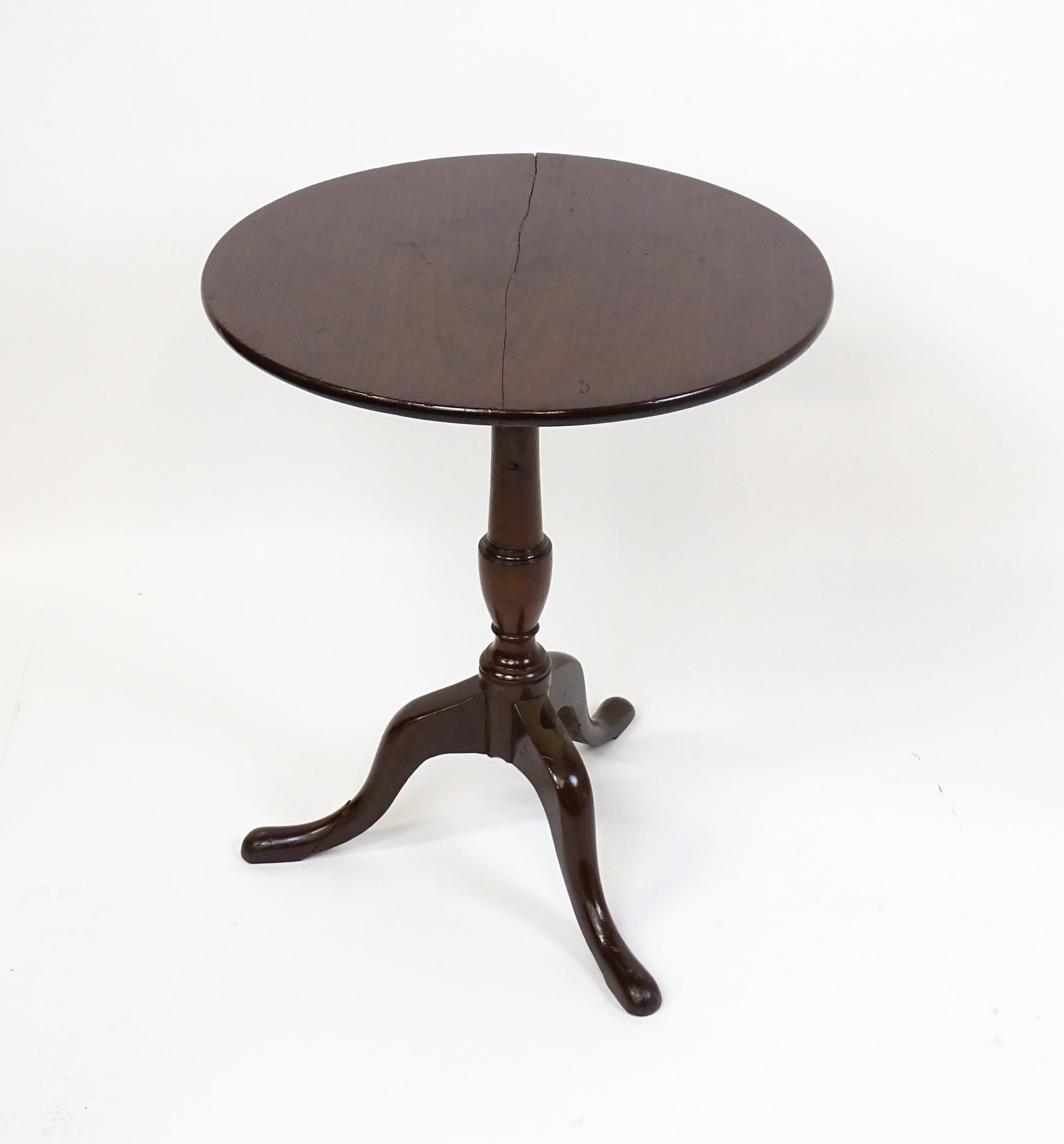 A 19thC mahogany tripod table with a turned pedestal above three cabriole legs. 27" high x 23" in - Image 3 of 5