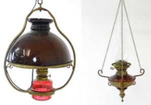A Hinks & Son hanging pendant oil lamp. Together with another. Largest approx. 18" high (2) Please