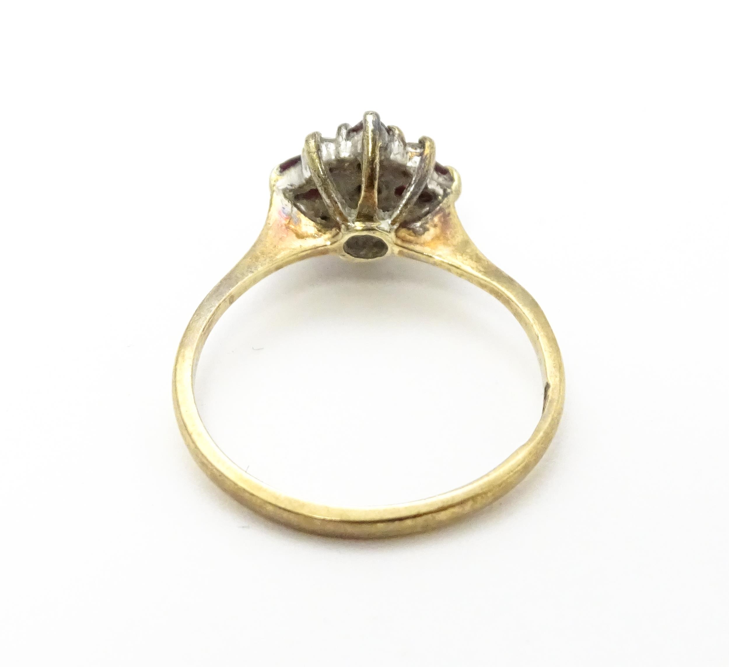 A 9ct gold ring set with diamonds and red stones. Ring size approx. M 1/2 Please Note - we do not - Image 5 of 7