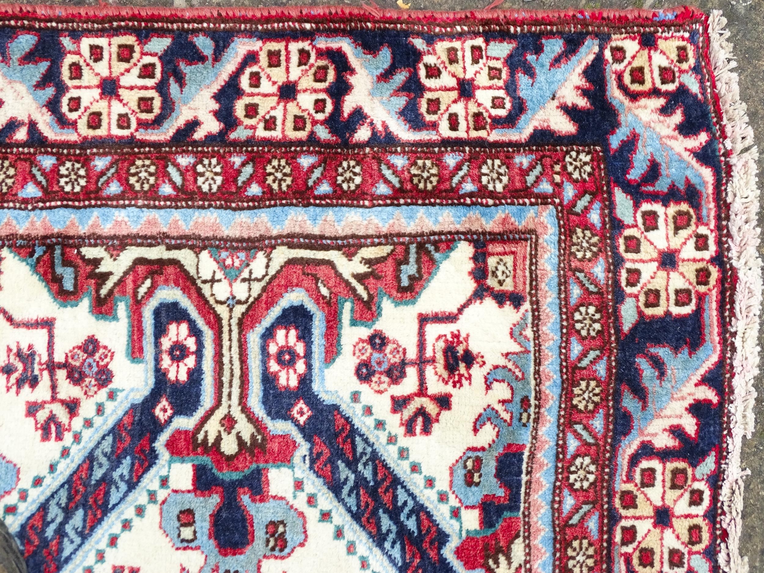 Carpet / Rug : A Persian Ardebil runner, the cream ground with floral and geometric repeating detail - Image 4 of 8