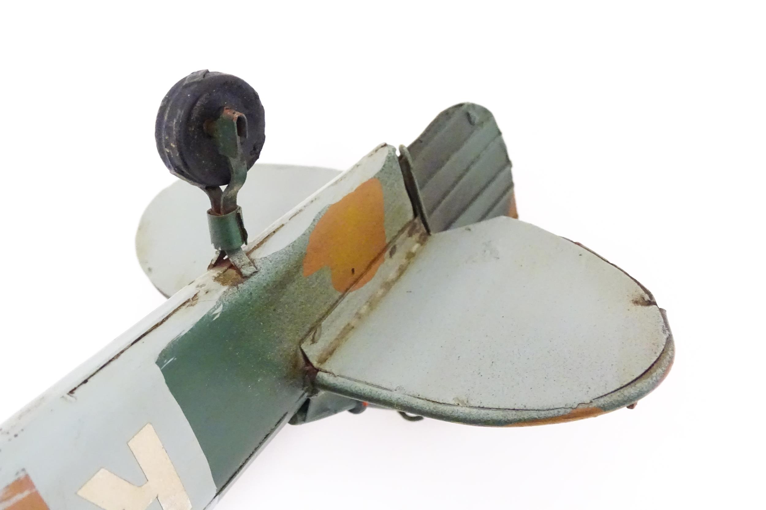 A 20thC scratch built tin plate scale model of a spitfire. Approx. 18" wide Please Note - we do - Image 2 of 10