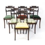 A set of six early / mid 19thC Irish dining chairs with floral and scroll carved mid and top rails