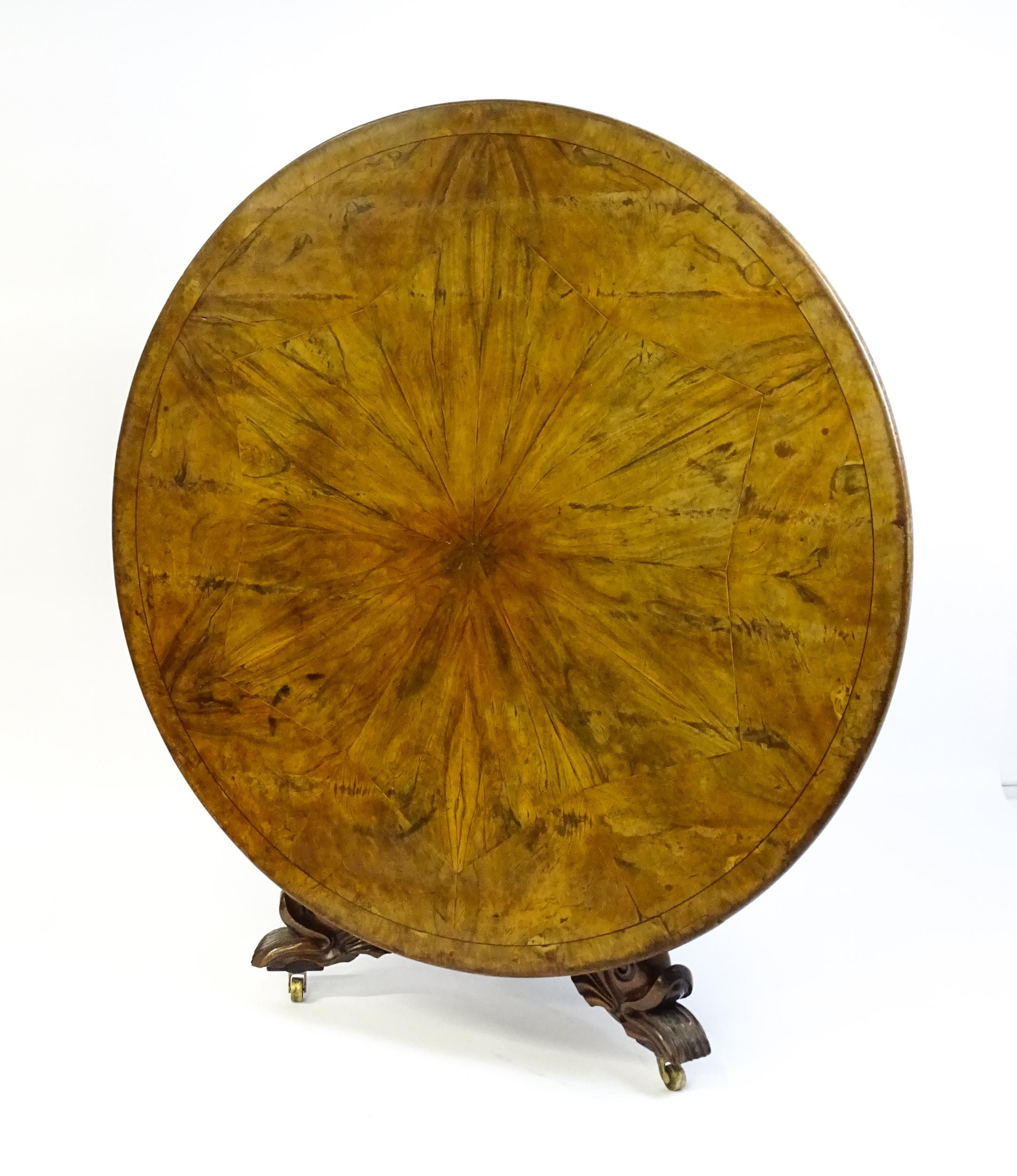 A 19thC dining table with an olive wood veneered circular top raised on a rosewood pedestal with - Image 6 of 15