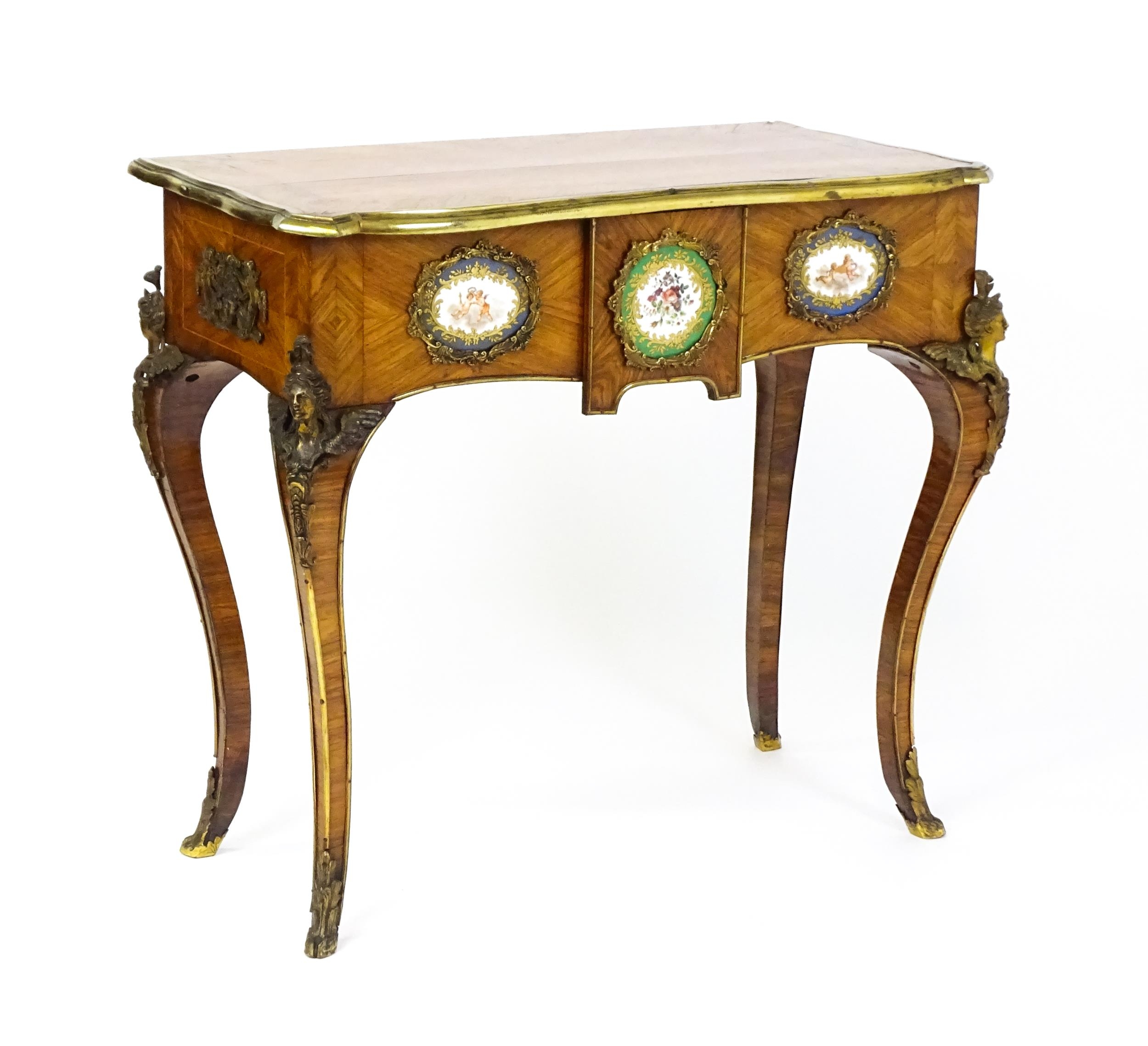 A mid 19thC kingwood side table with a brass moulding to the top edge and three Sevres style plaques - Image 3 of 14