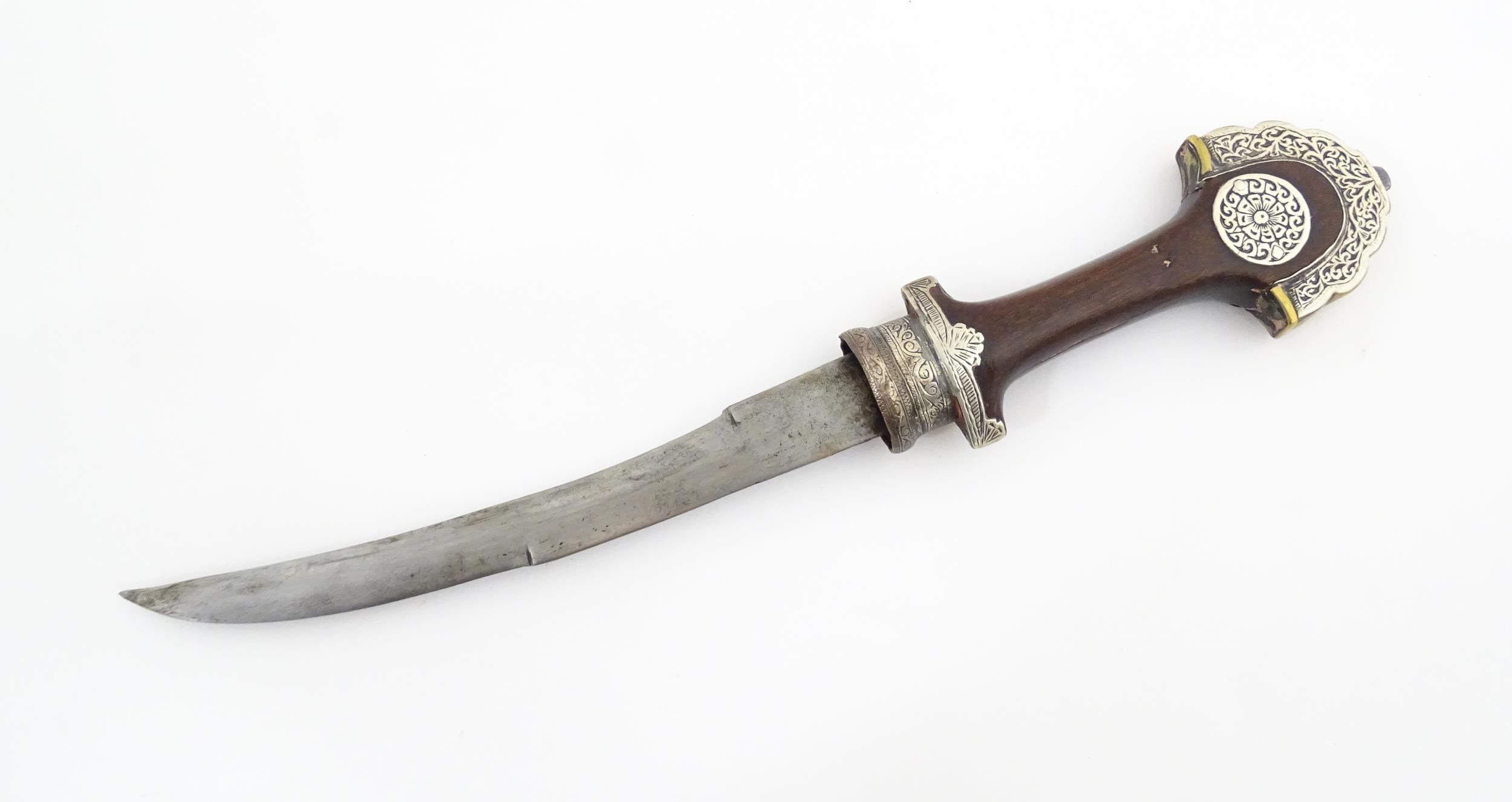 Ethnographic / Native / Tribal: A Moroccan Koummya / Jambiya dagger with carved wooden handle with - Image 10 of 14