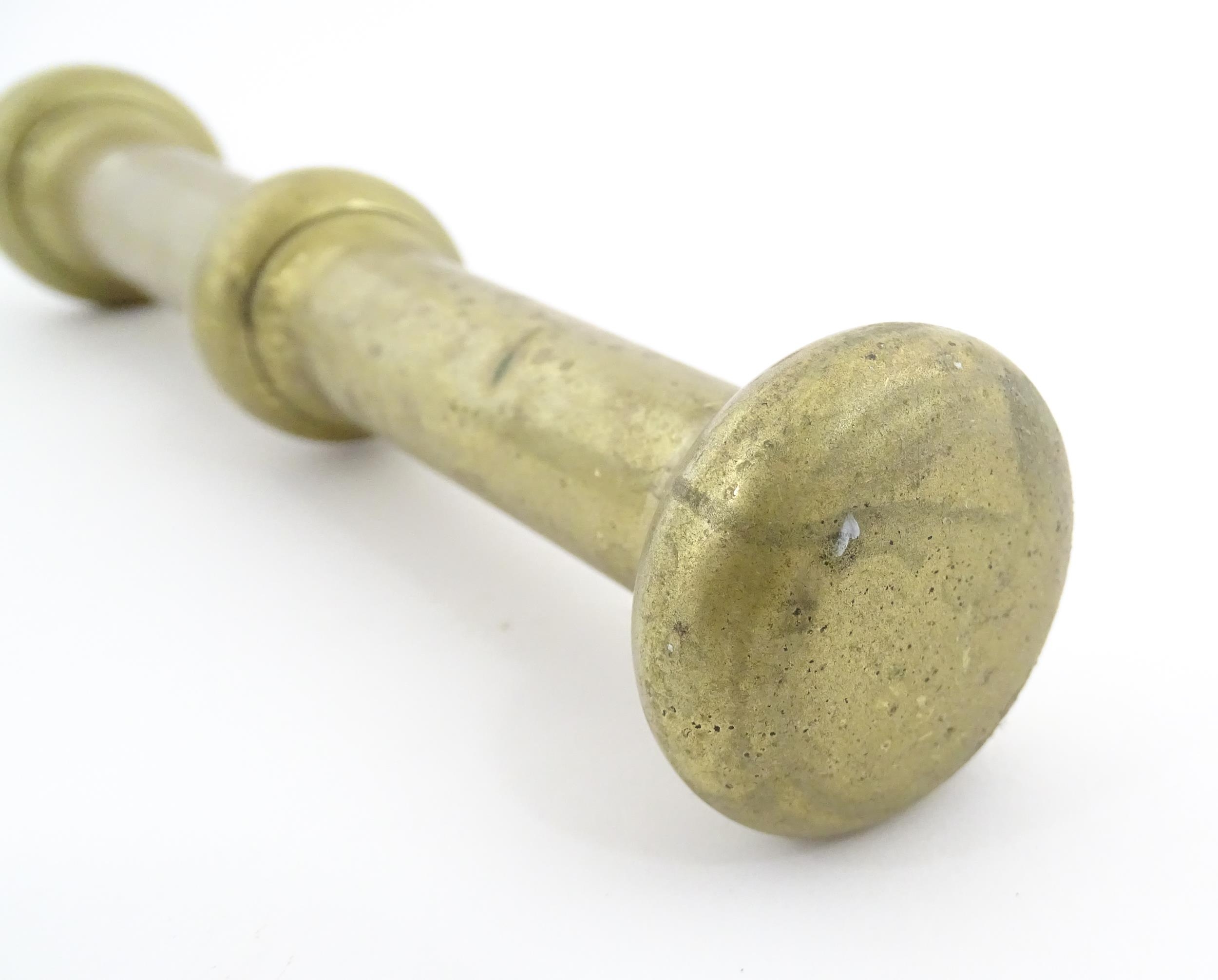 A 19thC brass pestle and mortar, the mortar of tapering form with twin rectangular handles. Mortar - Image 14 of 14