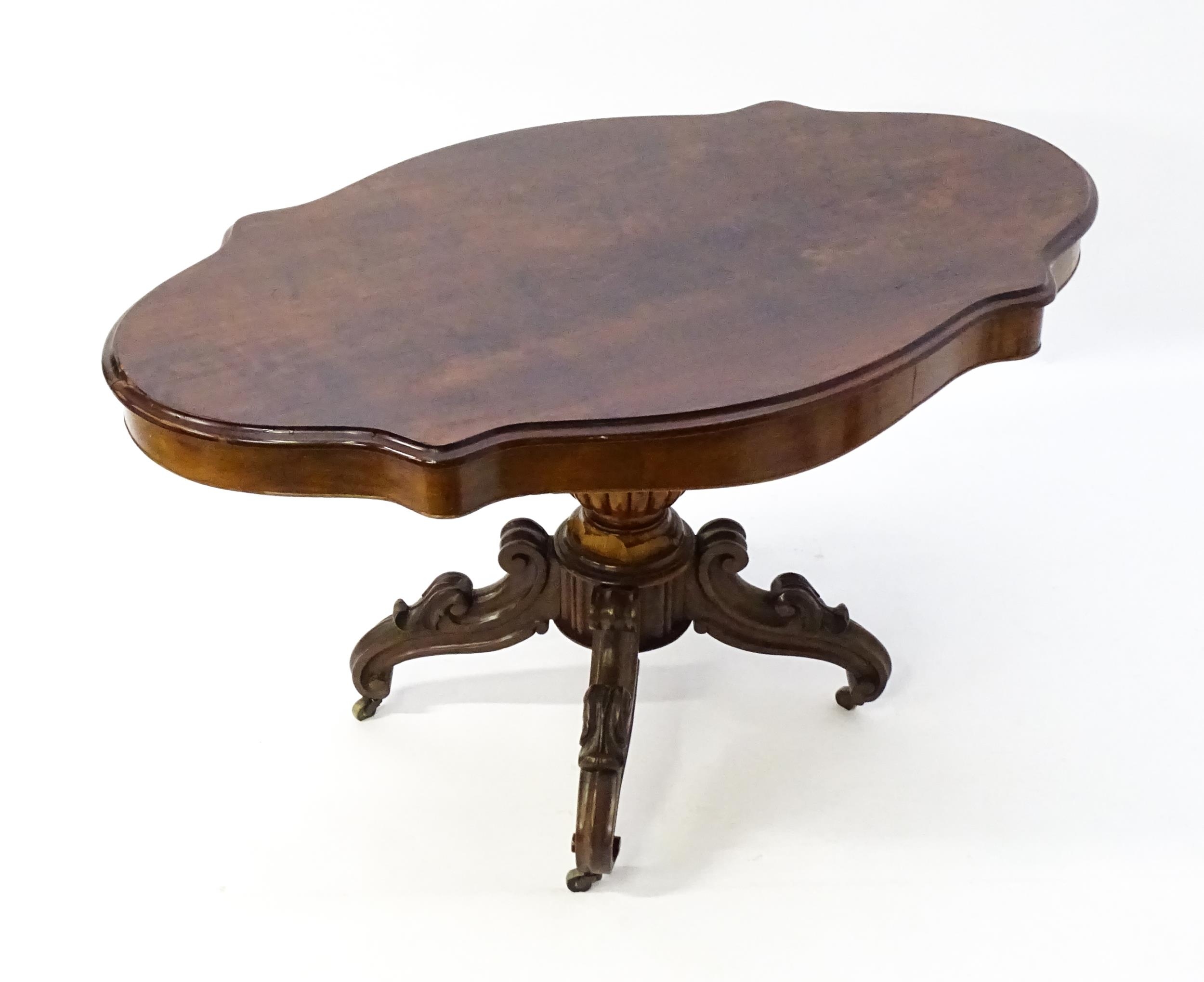 A 19thC mahogany centre table with a moulded top having two frieze drawers, the pedestal having - Image 3 of 9