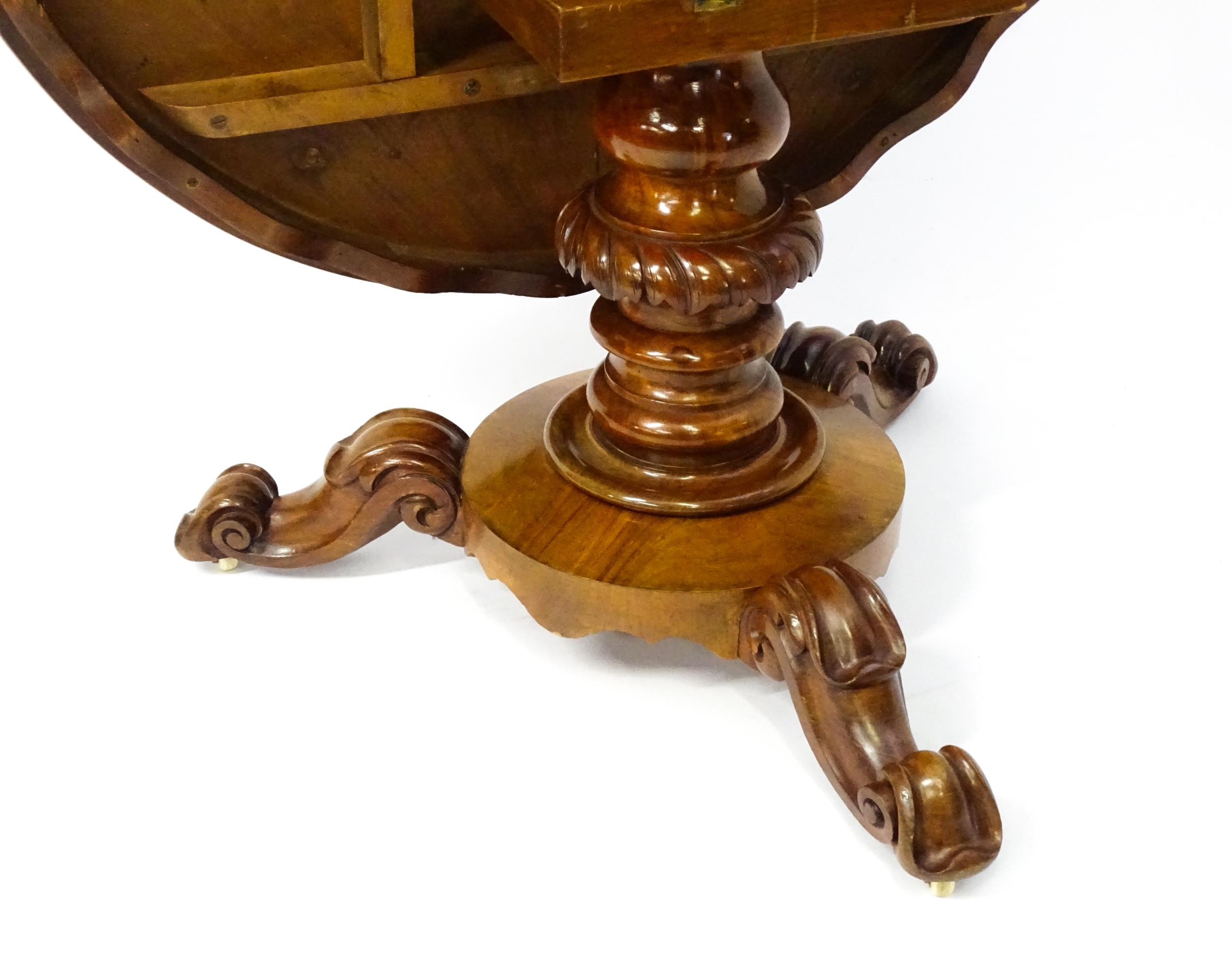 A 19thC mahogany tilt top breakfast table with a carved frieze above a turned and carved pedestal - Image 6 of 11
