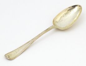 A Victorian silver dessert spoon hallmarked Sheffield 1874, maker William Hutton & Sons (Thomas