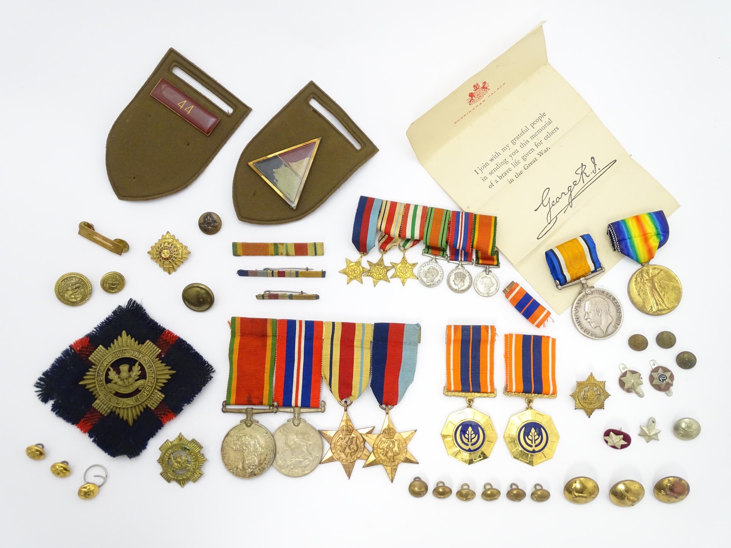 Militaria : a quantity of 20thC medals and insignia, comprising two WWI campaign medals to Gnr. W. - Image 3 of 16