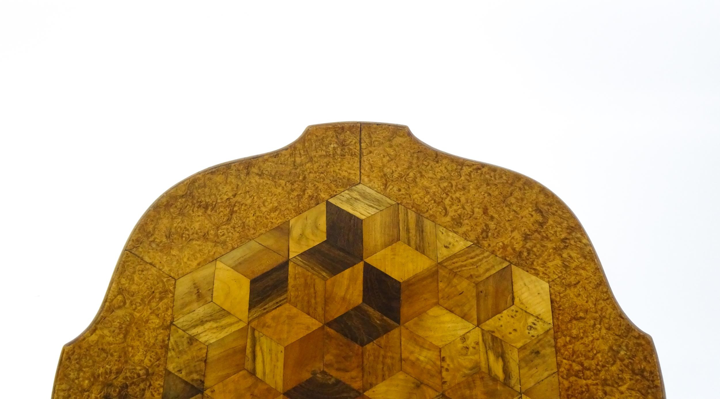 A 19thC tripod table with a burr amboyna veneered top surrounding a central parquetry style sample - Image 4 of 10