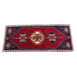 Carpet / Rug: A South West Persian qashgai runner, the red and blue ground with central geometric