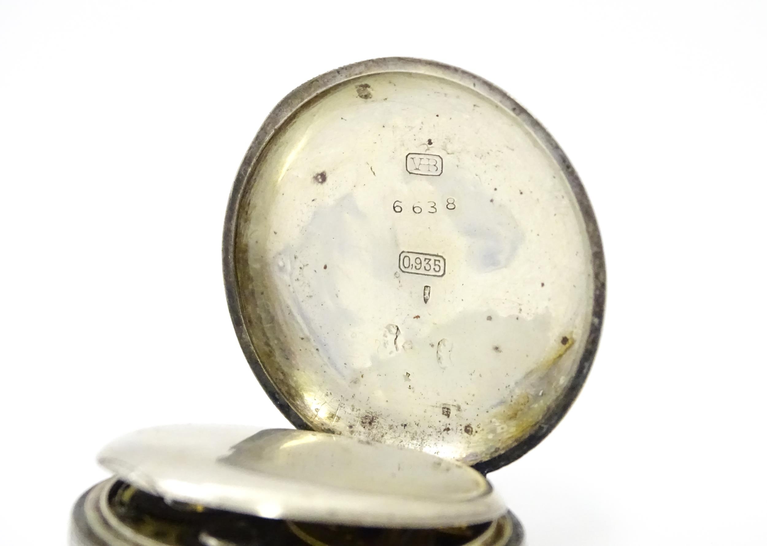 A Swiss silver cased pocket / fob watch with enamel detail and Roman Numerals. Approx 1 /4" wide - Image 9 of 11
