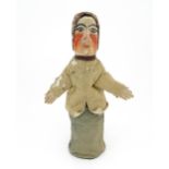 Toy: A 19thC French glove puppet with wooden head and hands and hand painted features. Approx. 18"