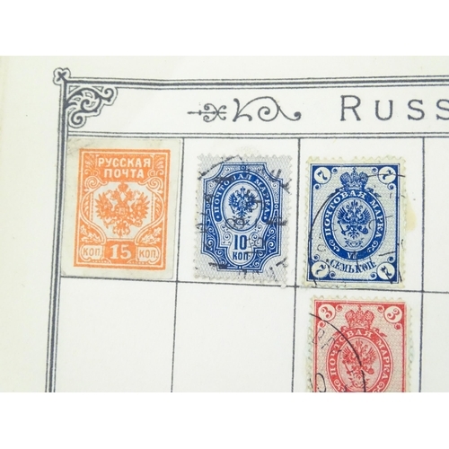 Stamps / Postal History: An early 20thC postage stamp album, containing numerous affixed worldwide - Image 11 of 19