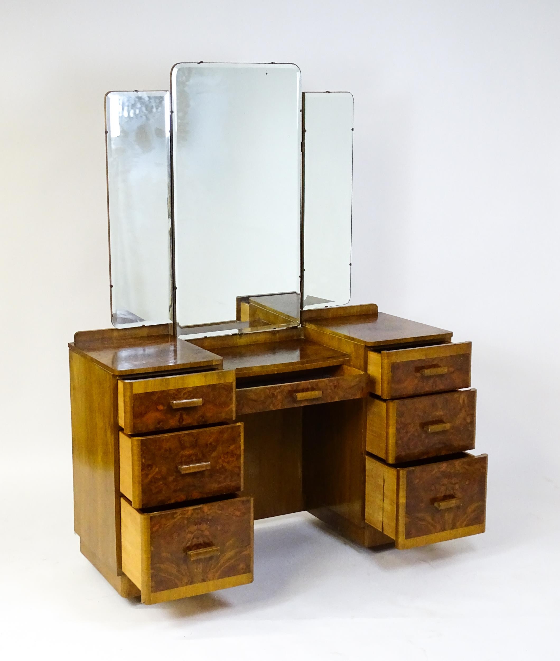 A mid 20thC Art Deco style burr walnut veneered dressing table with a triptych mirror above a - Image 6 of 9