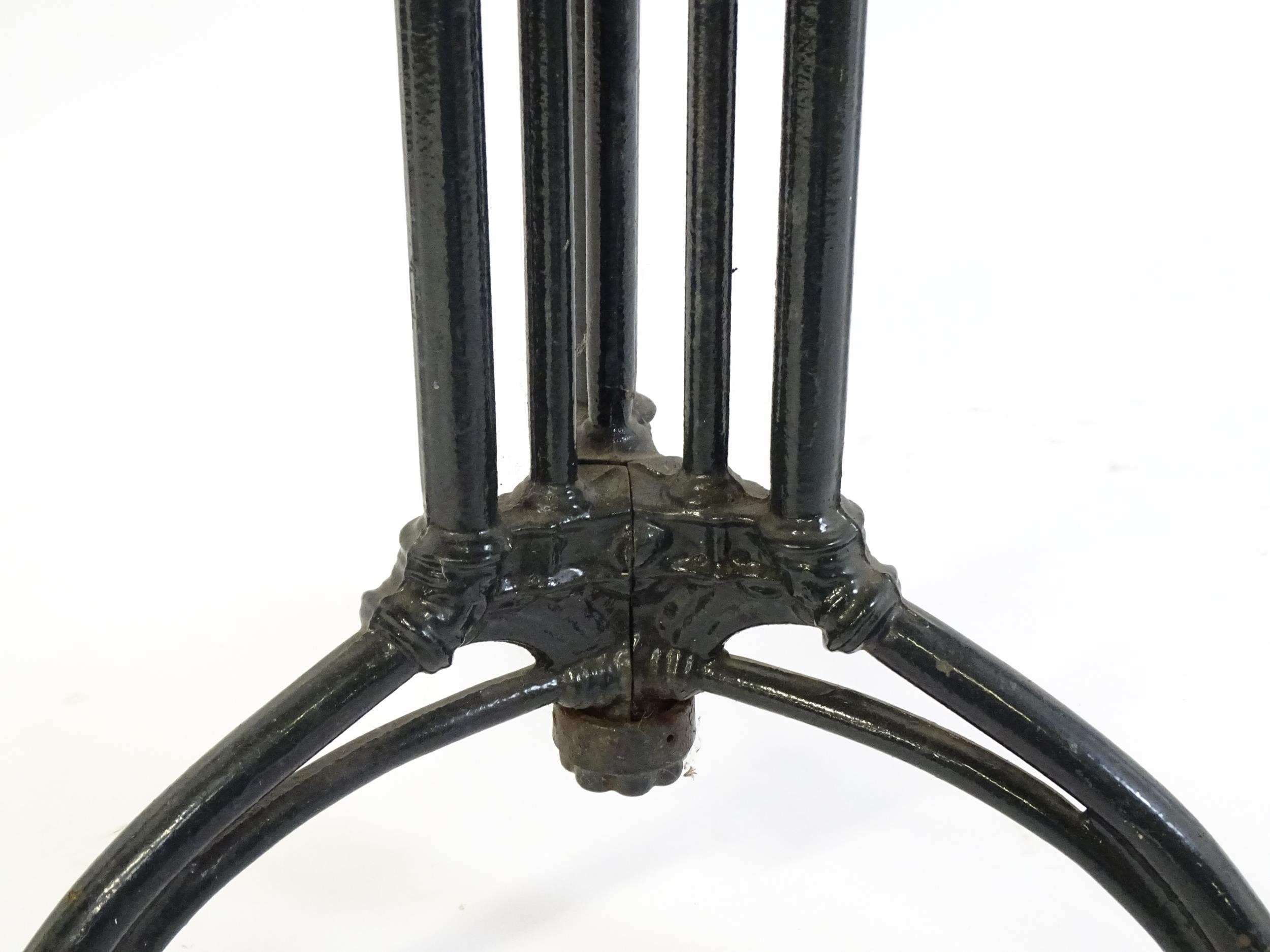 An early 20thC cast iron based pub / cafe / bistro table, with squared advertising top marked - Image 6 of 12