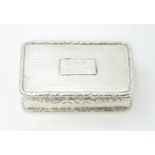 A Geo IV silver snuff box hallmarked Birmingham 1826, maker John Betteridge. Approx. 3" wide