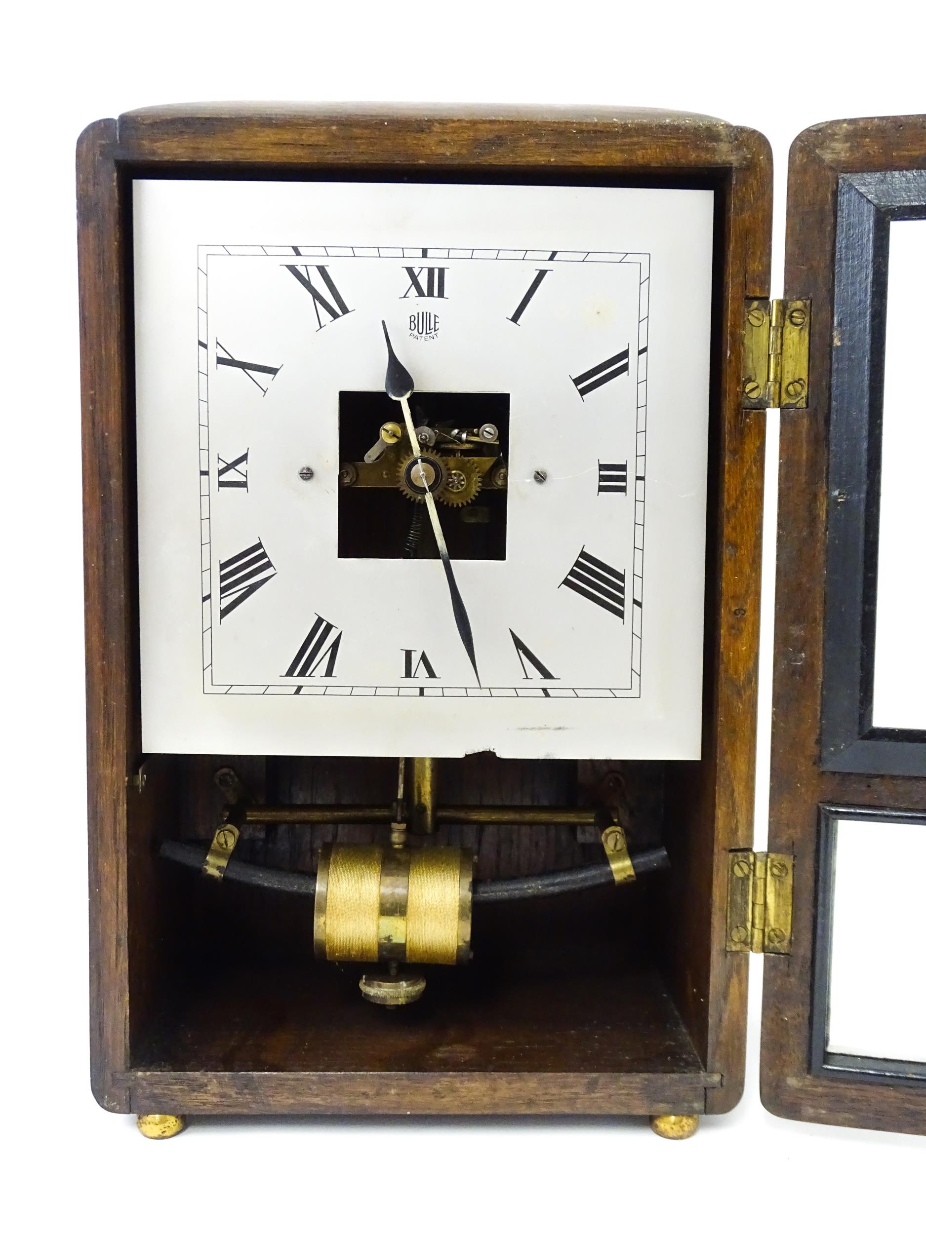 Bulle : A French Art Deco oak cased electric mantel clock by Bulle. The dial signed Bulle Patent - Image 4 of 9