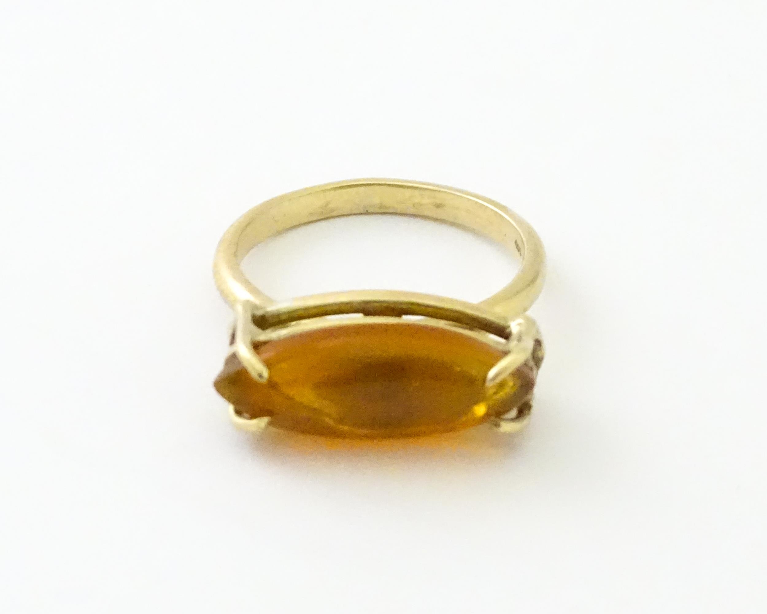 A 9ct gold ring with fire opal approx 3/4" long. Ring size approx. M Please Note - we do not make - Image 7 of 7