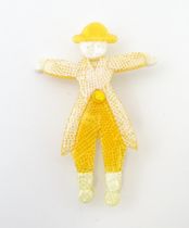 Lea Stein Paris : A brooch formed as a man in yellow. Approx. 2 3/4" high Please Note - we do not