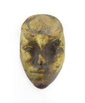 A 20thC bronze mask / plaque modelled as a face. Approx. 7 1/2" long Please Note - we do not make