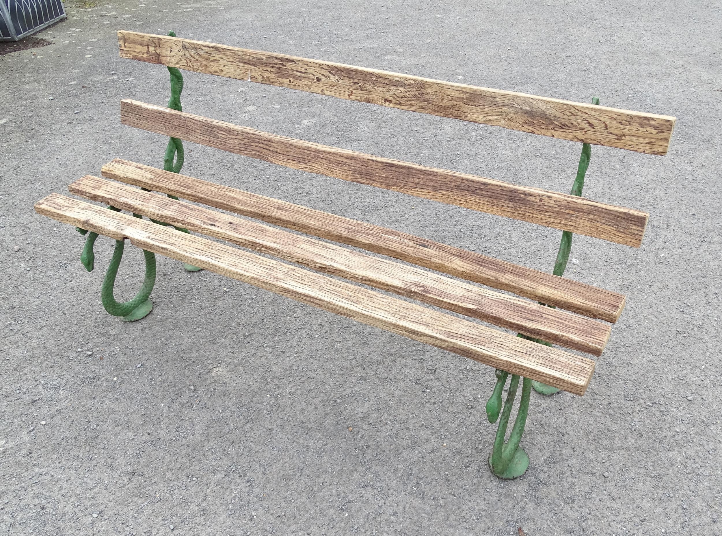 Garden & Architectural : a Coalbrookdale style cast iron and oak slatted garden bench, the