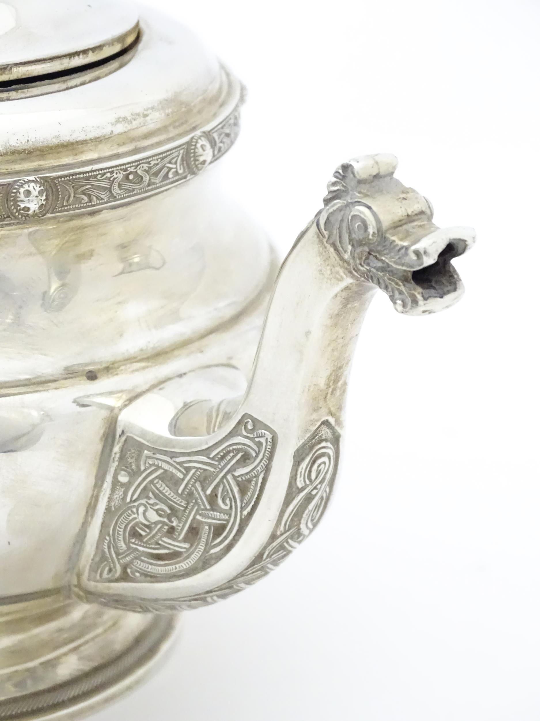 A three piece silver tea set comprising teapot, hot water pot and cream jug, with Celtic style - Image 4 of 20