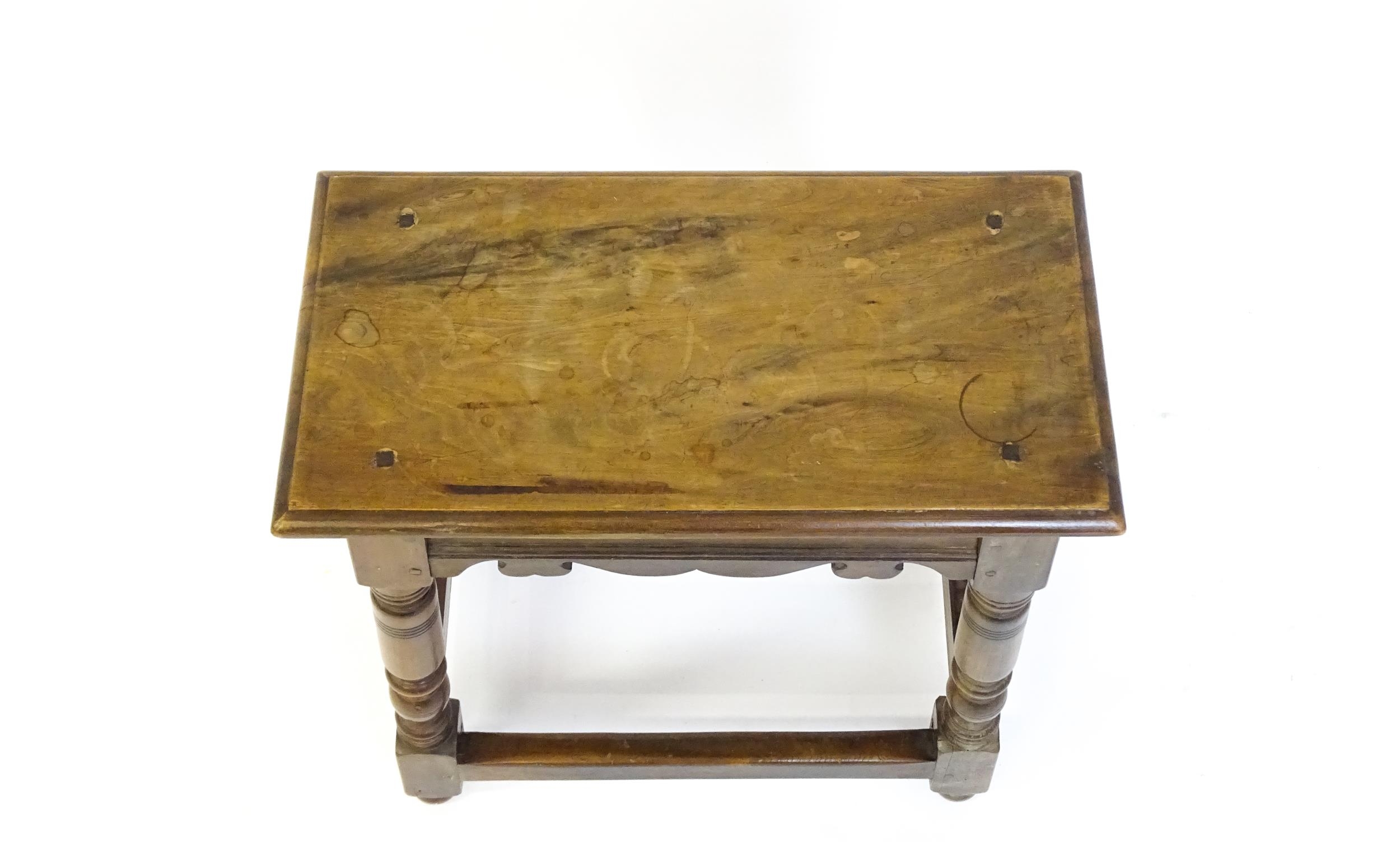 A 19thC walnut join stool of peg jointed construction, with a rectangular top above a moulded - Image 3 of 6