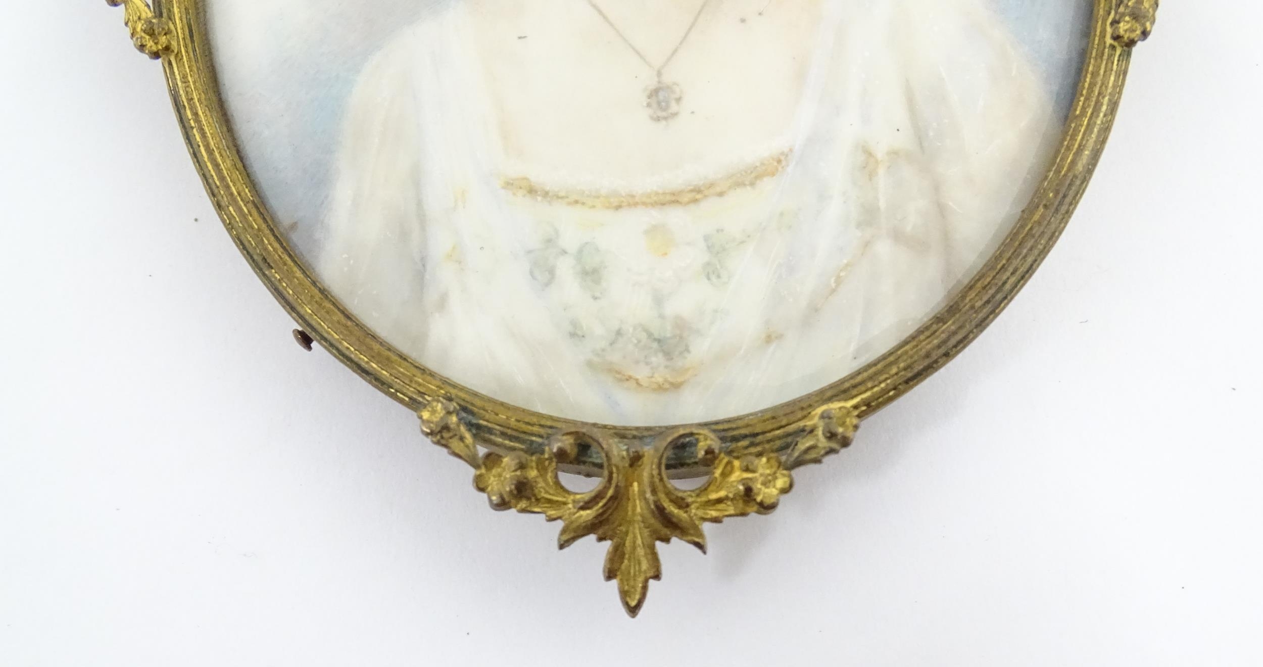 A 19thC watercolour portrait miniature depicting a young lady wearing a white dress with floral - Image 9 of 9