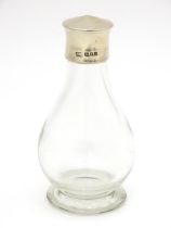 A glass private / travelling communion bottle / flask with silver screw lid, hallmarked London 1943,