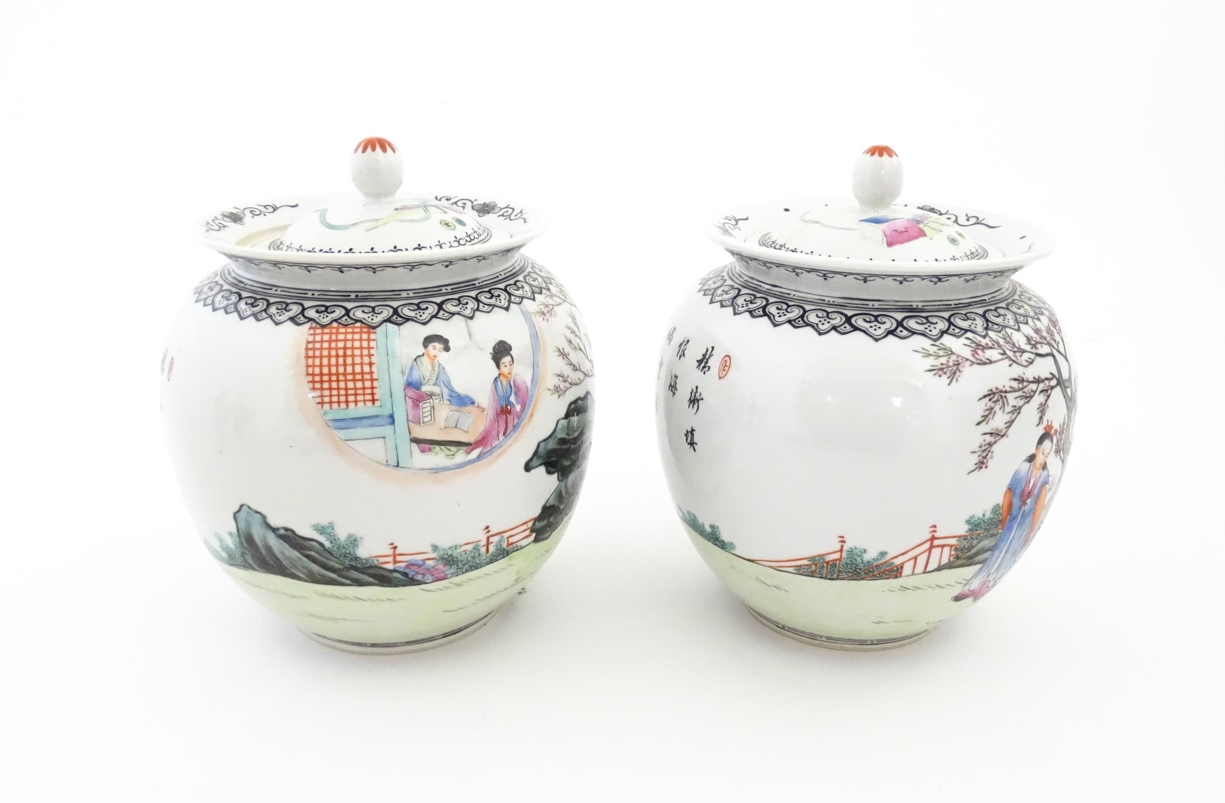 A pair of Chinese pot and cover vases decorated with ladies in a landscapes, and Character script. - Image 7 of 10