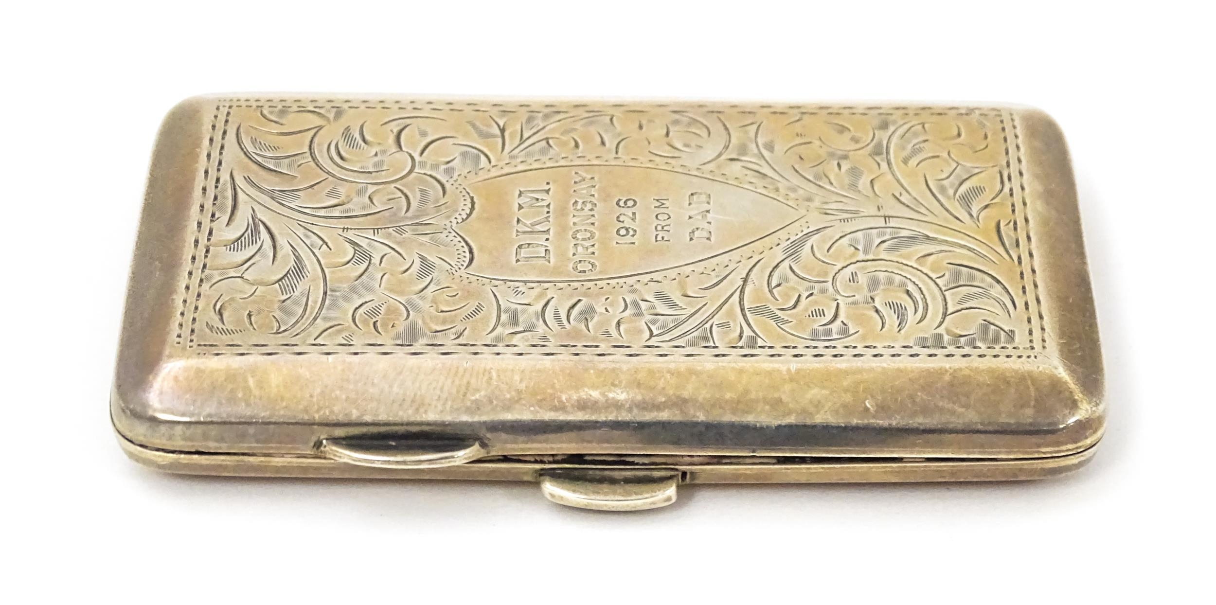 A silver cigarette case with acanthus decoration and engraved 'D. K. M. Oronsay ...', opening to - Image 5 of 7