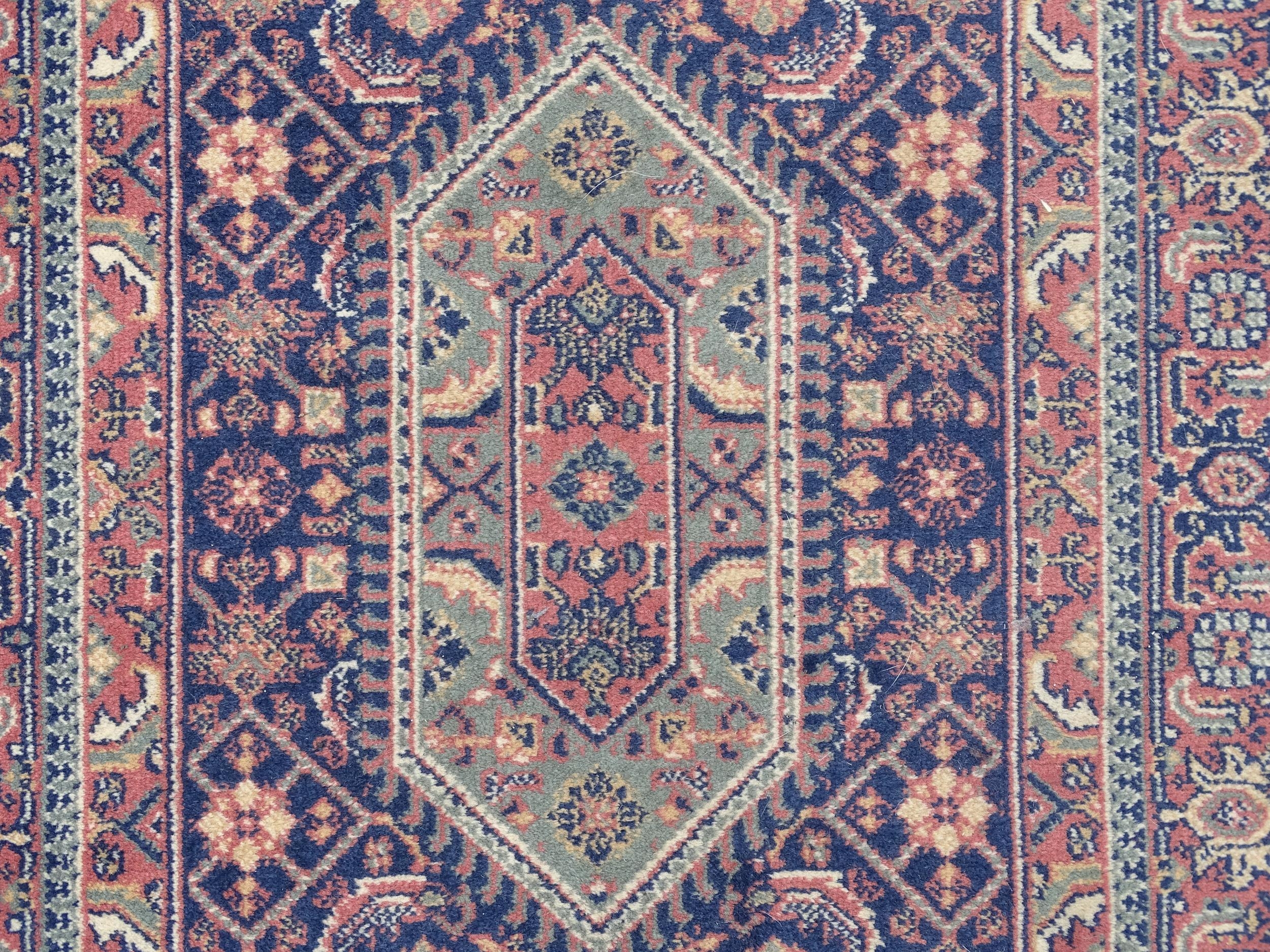 Carpet / Rug : A blue ground runner decorated with three central medallions with floral and scroll - Image 6 of 8