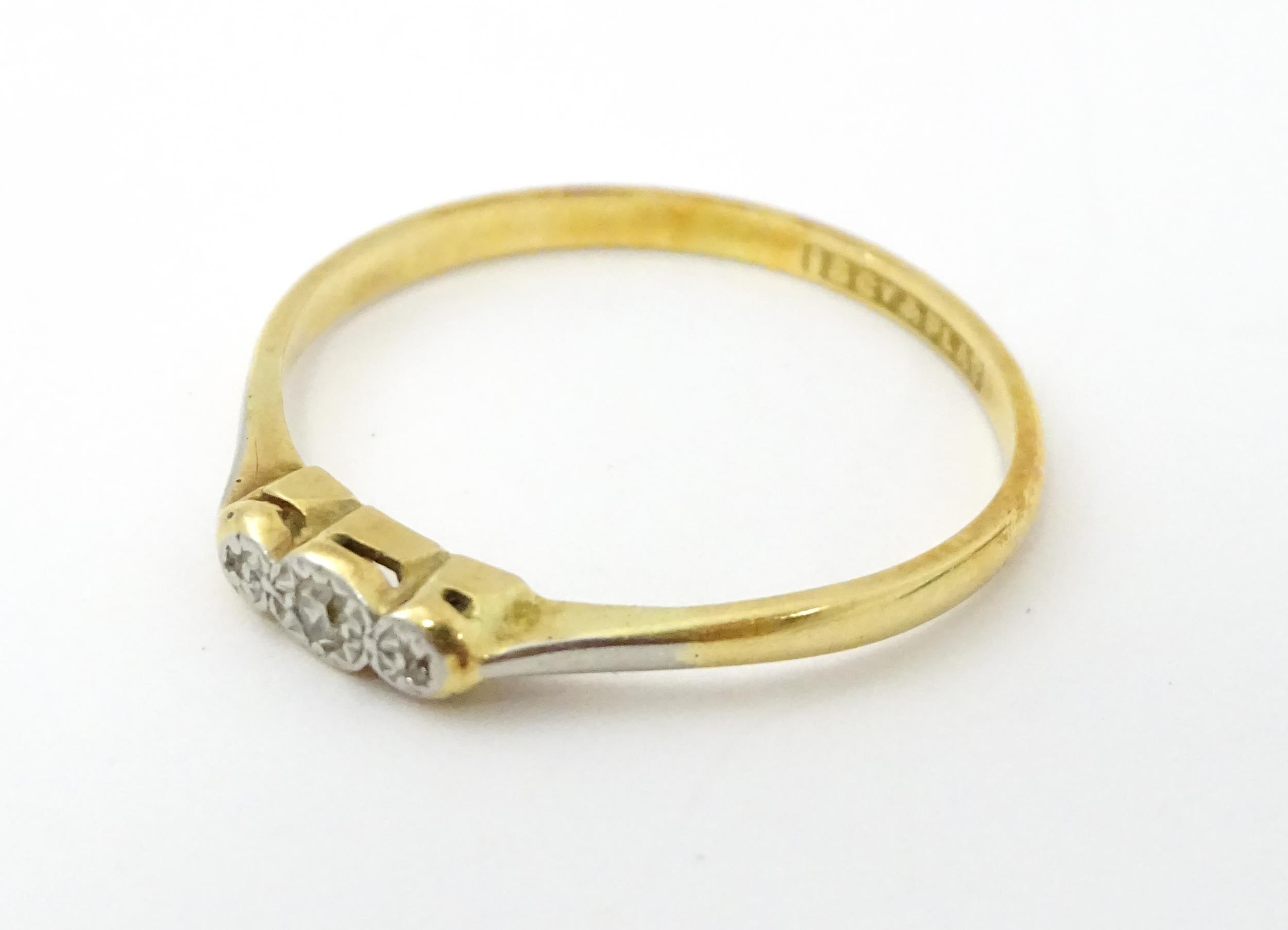 A 18ct gold and platinum ring with illusion set diamond. Ring size approx. X 1/2 Please Note - we do - Image 3 of 6