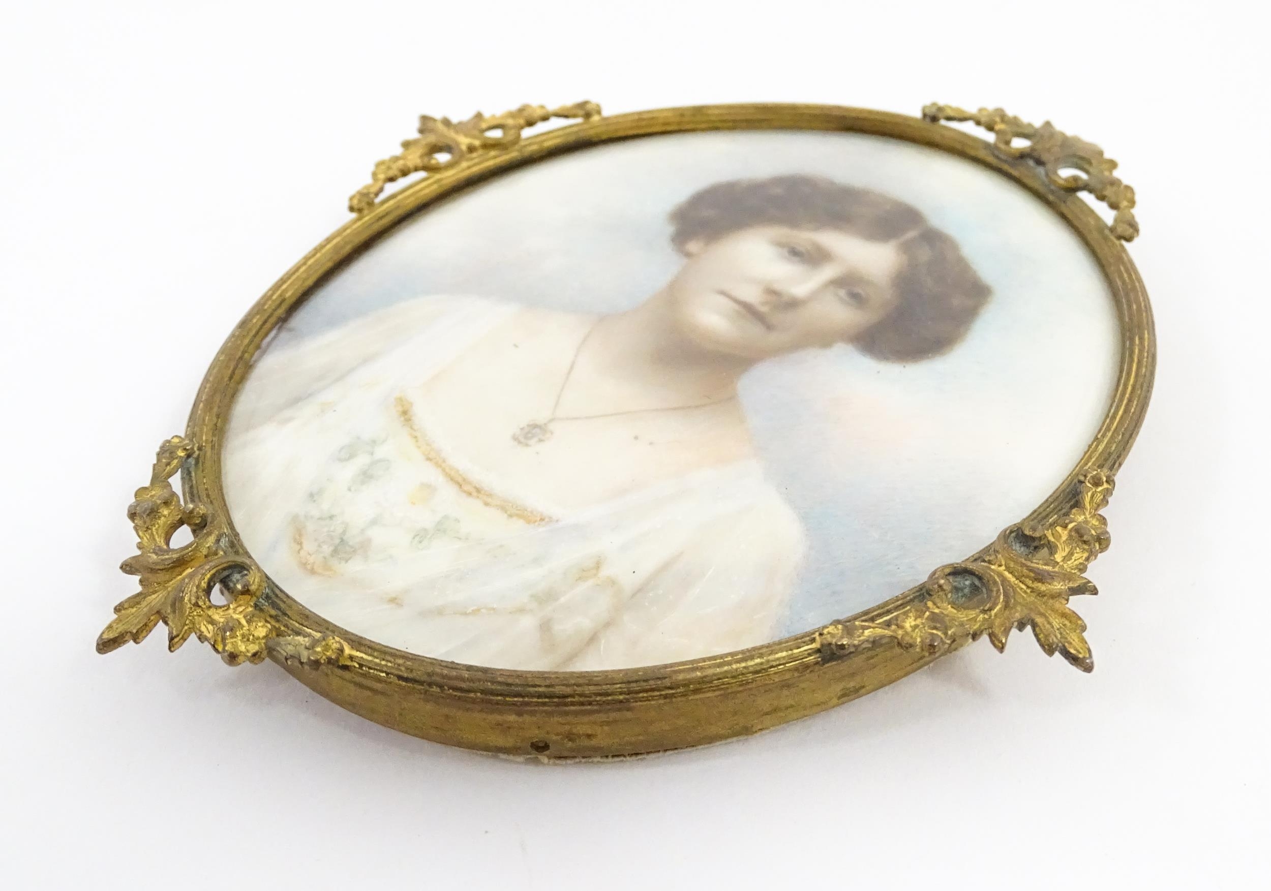 A 19thC watercolour portrait miniature depicting a young lady wearing a white dress with floral - Image 4 of 9