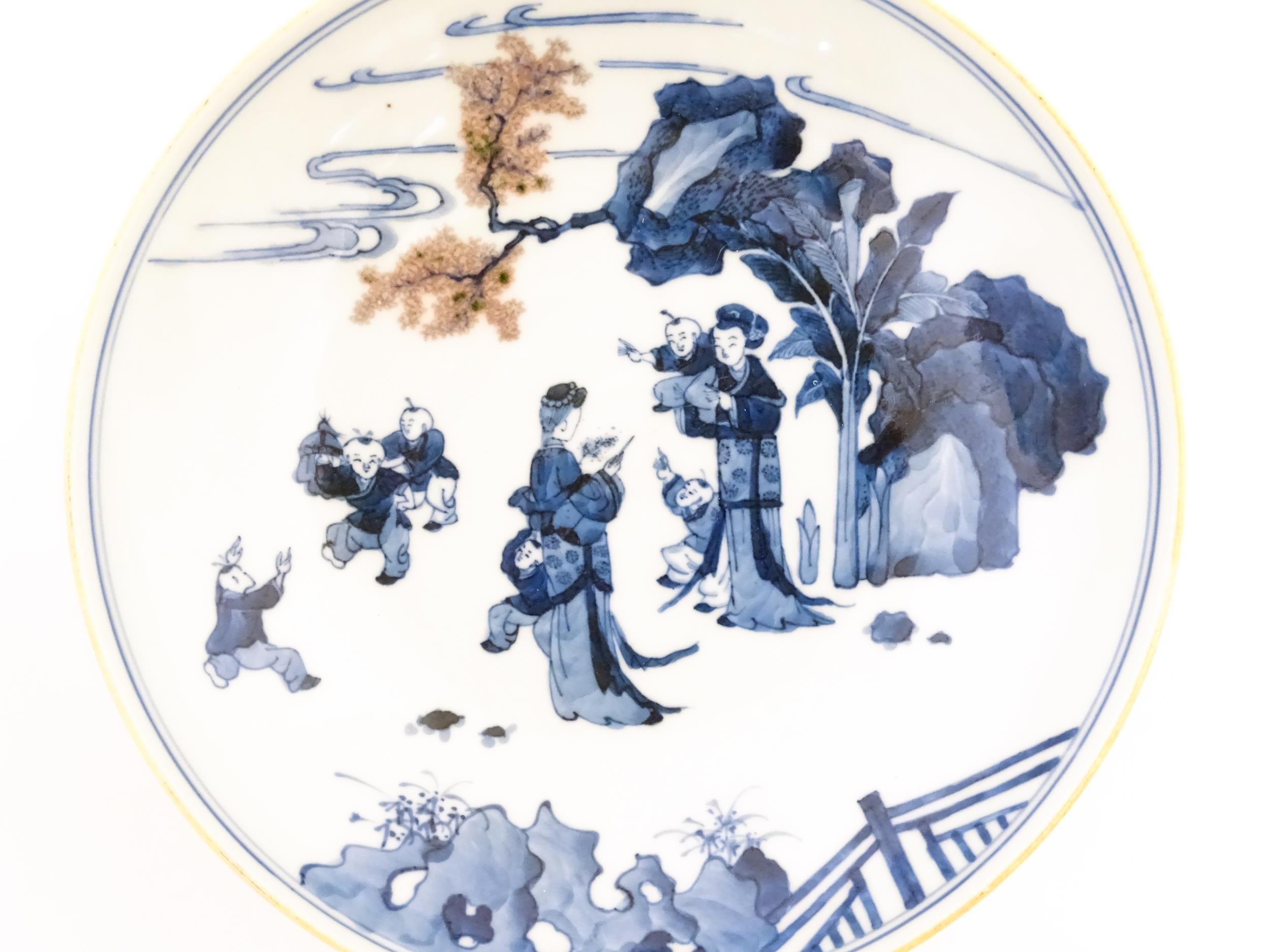 A Chinese blue and white dish / bowl decorated with figures in a landscape. Character marks under. - Image 3 of 4