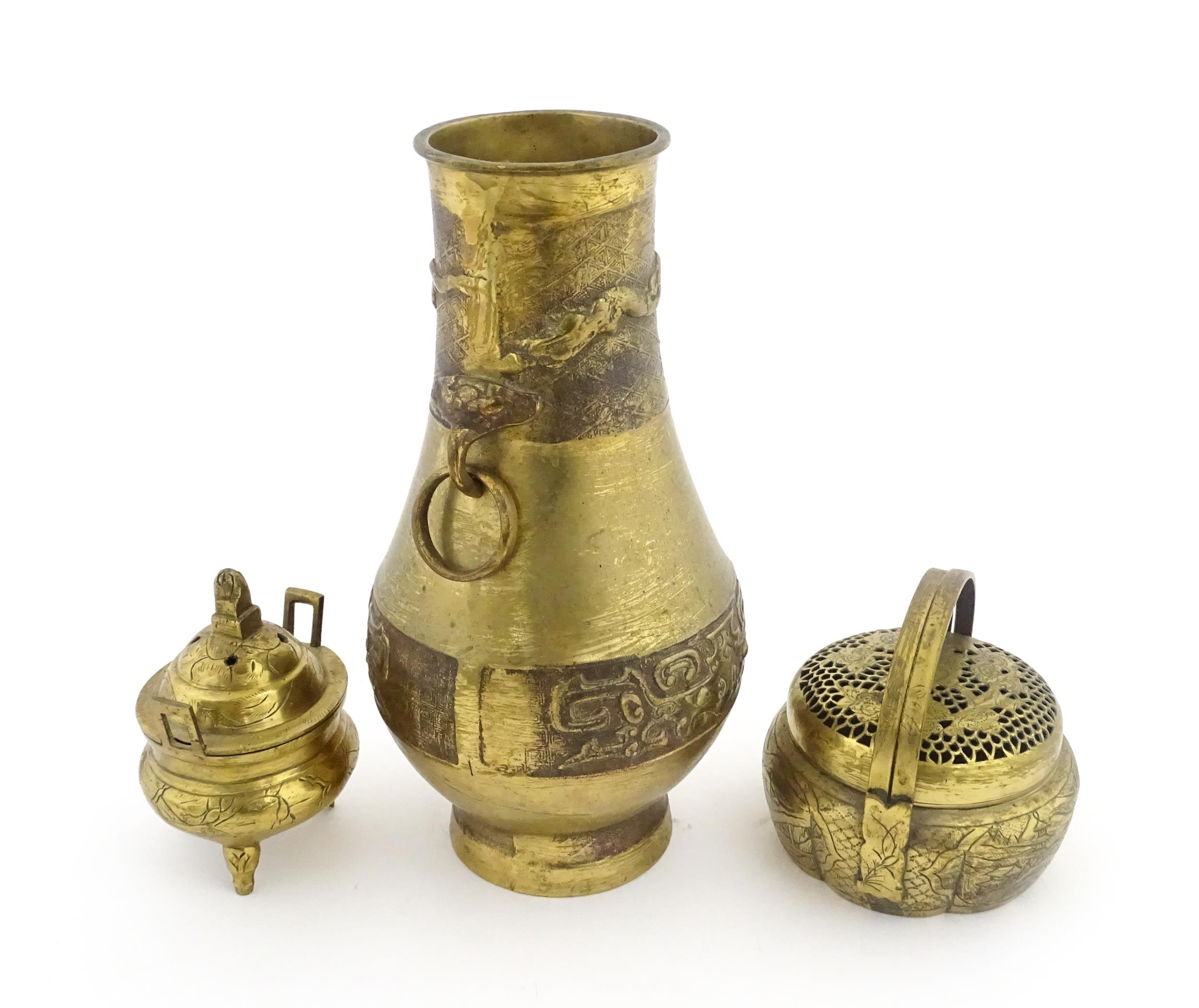 Three items of Chinese brass ware to include a baluster vase with twin ring handles decorated with - Image 4 of 9