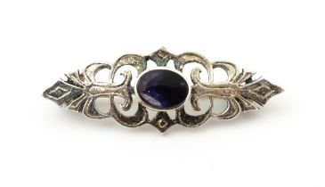 A brooch marked 'silver' and set with Blue John to centre. Approx 1 3/4" Please Note - we do not