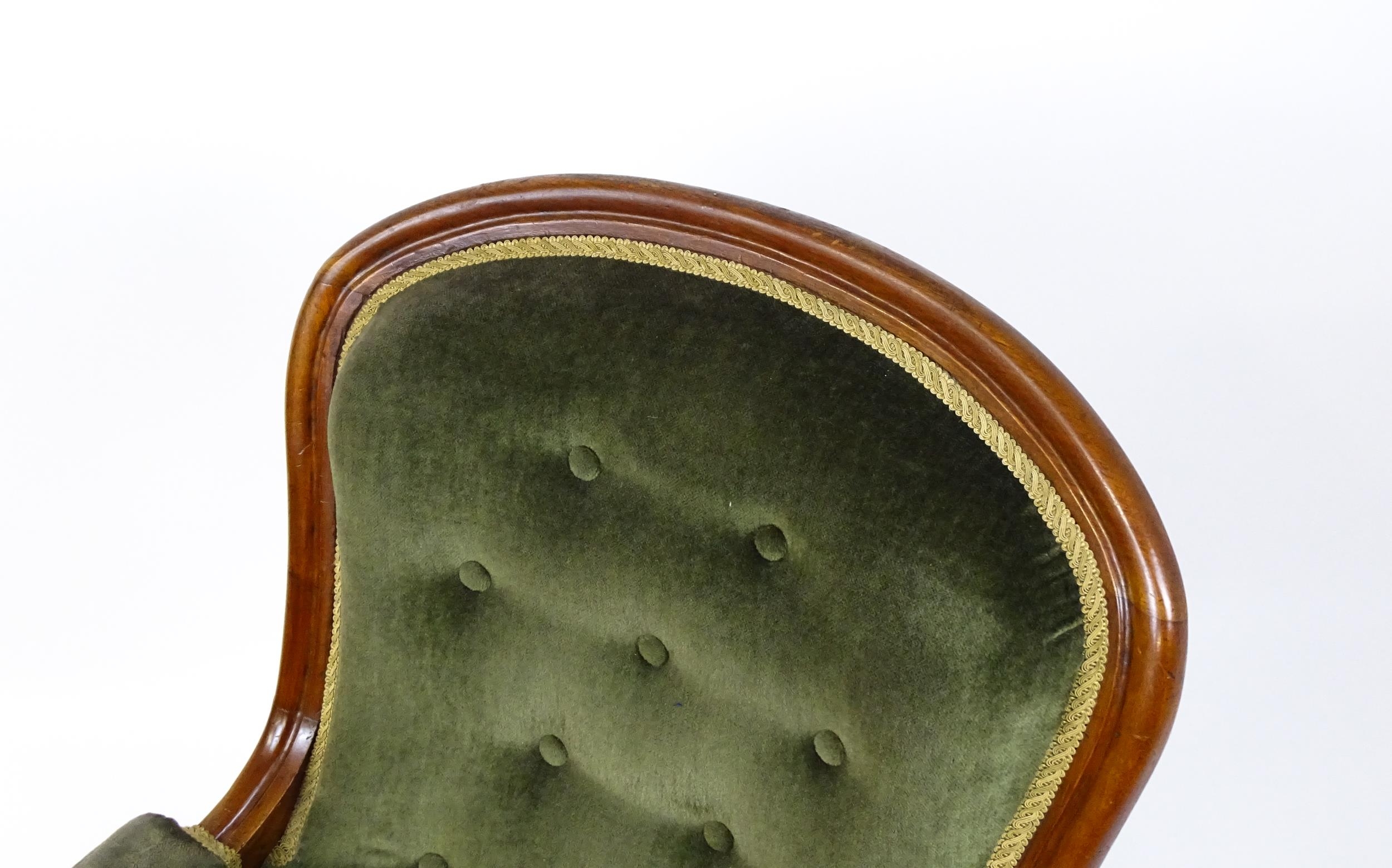 A 19thC mahogany open armchair, the spoon back design having a moulded frame and deep buttoned - Image 7 of 8