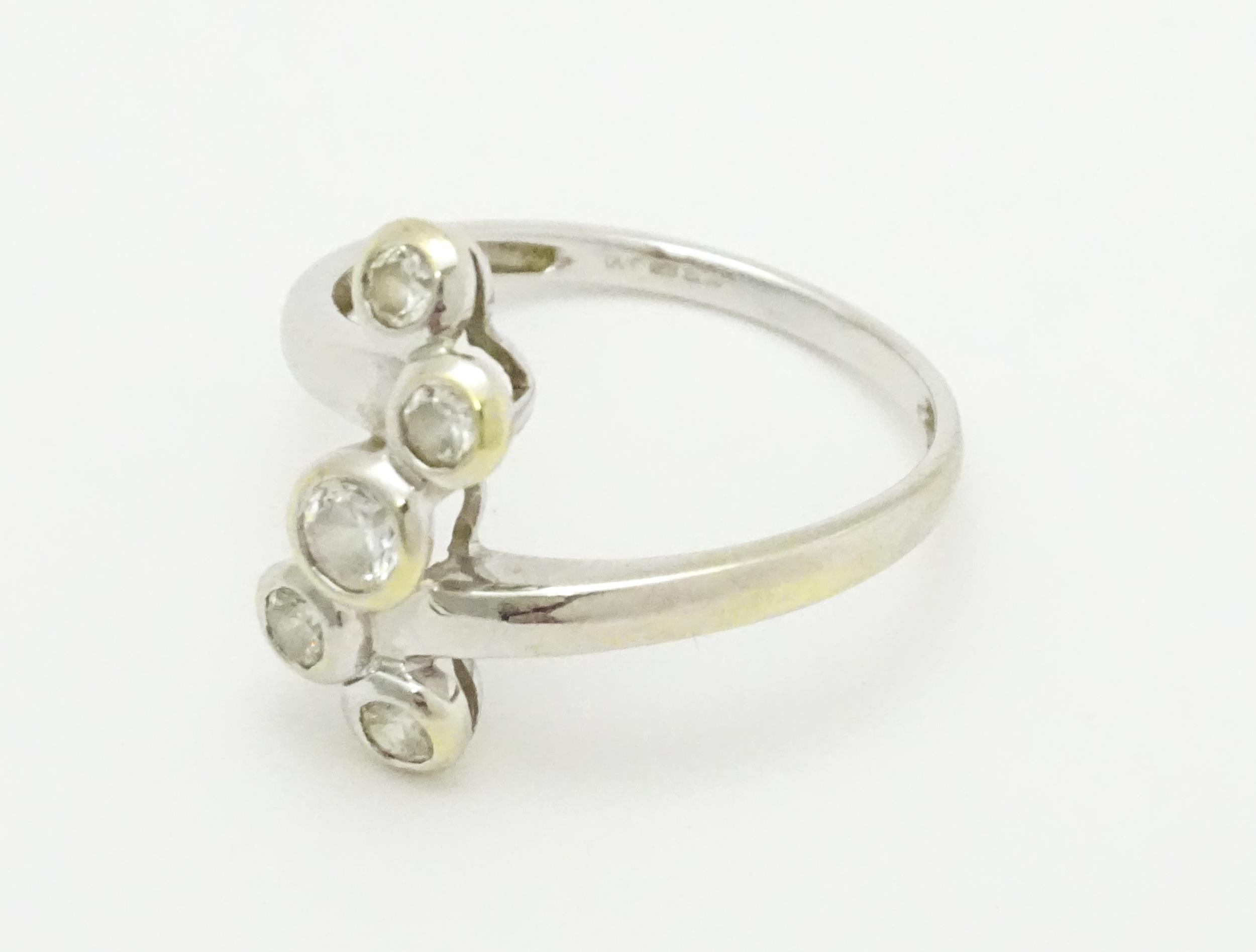 A 14ct white gold ring set with five white stones. Ring size approx. U Please Note - we do not - Image 4 of 8