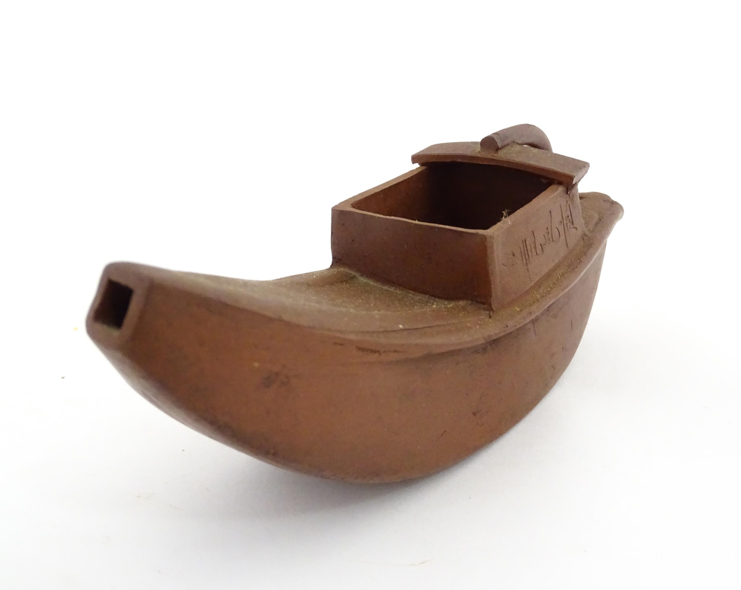 A Chinese Yixing teapot modelled as a boat with incised Character marks and Character seal under. - Image 4 of 8