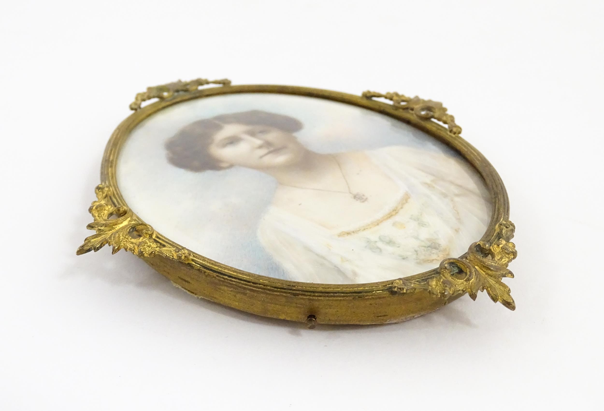 A 19thC watercolour portrait miniature depicting a young lady wearing a white dress with floral - Image 7 of 9