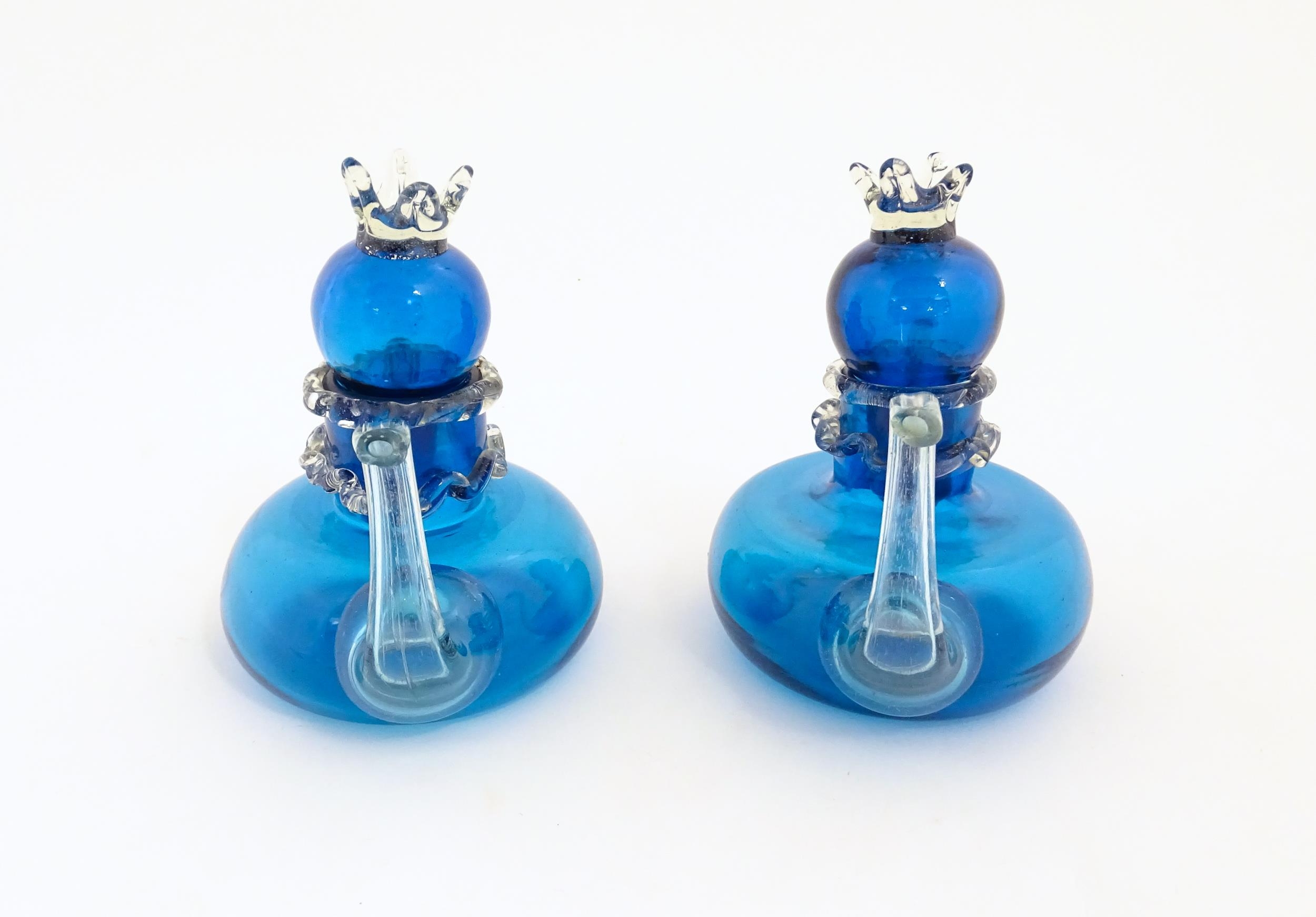 An unusual pair of turquoise glass oil / vinegar bottles of teapot form, the lids surmounted by - Image 7 of 11