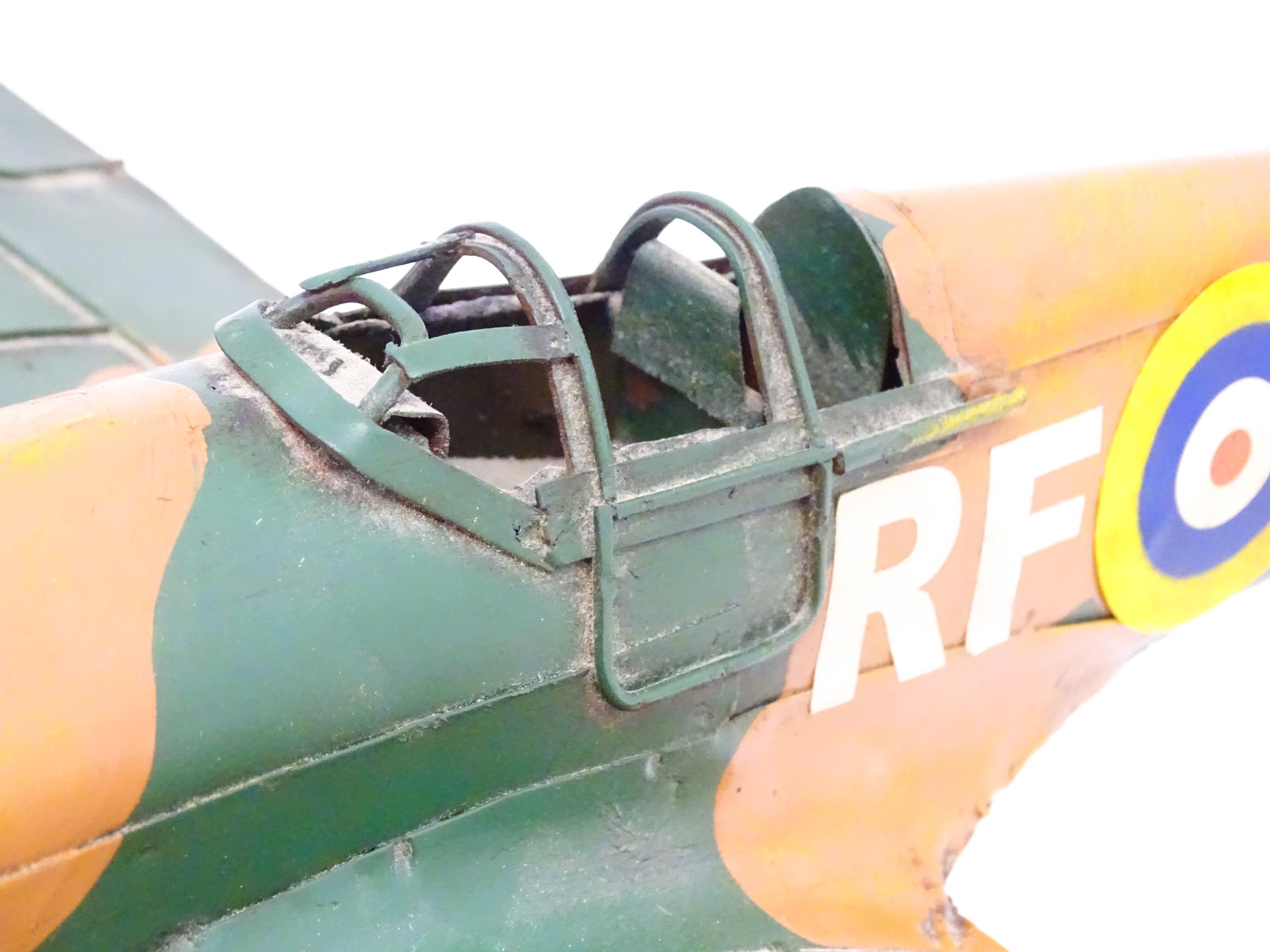 A 20thC scratch built tin plate scale model of a spitfire. Approx. 18" wide Please Note - we do - Image 6 of 10